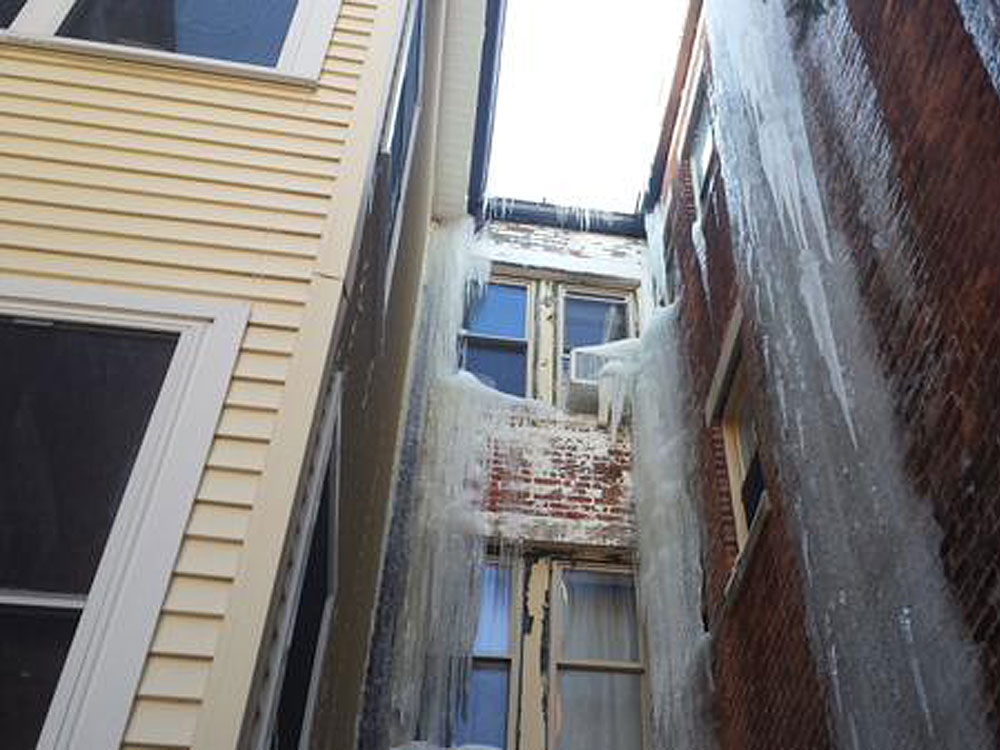 Big ice dams on roof and windows