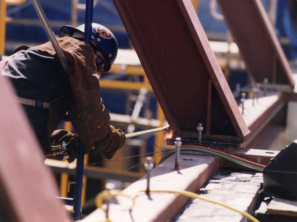 Welder working on construction site