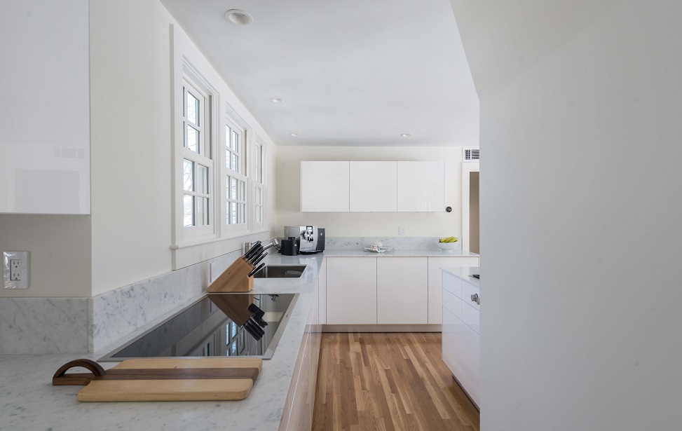Beautiful white marble counter top for this modern kitchen in this Chestnut Hill MA